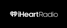 The iHeartRadio logo with a heart and wireless signal design.